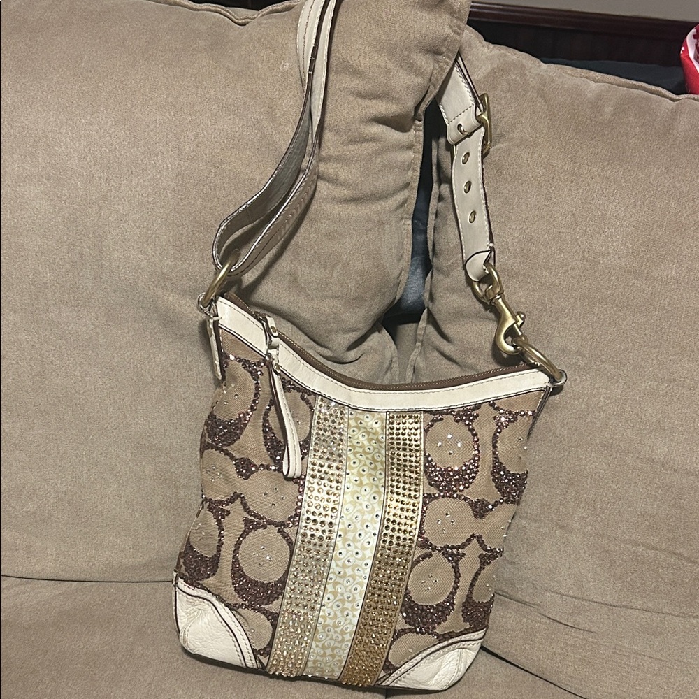 Coach J0668-10542 with crystals.